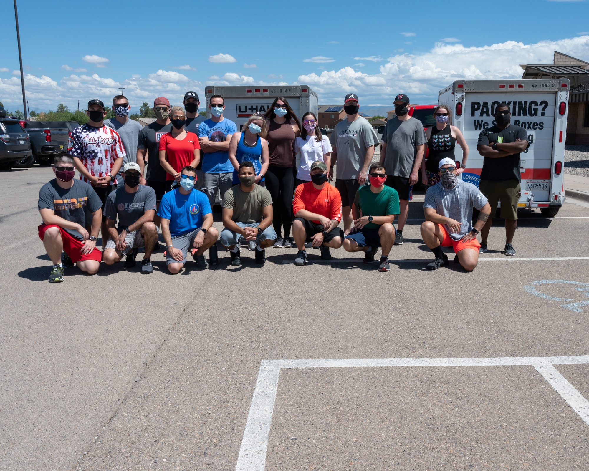 Volunteers from the Holloman Air Force Base, New Mexico, and Cannon AFB, N.M., communities pose for a photo Sept. 3, 2021 on Holloman AFB, N.M. Volunteers from Cannon AFB collected and delivered a donation valued at $80,000 to be given to Afghan refugees in support of Operation Allies Welcome. The Department of Defense, through U.S. Northern Command, and in support of the Department of Homeland Security, is providing transportation, temporary housing, medical screening, and general support for up to 50,000 Afghan evacuees at suitable facilities, in permanent or temporary structures, as quickly as possible. This initiative provides Afghan personnel essential support at secure locations outside Afghanistan. (U.S. Air Force photo by Tech. Sgt. BreeAnn Sachs)