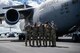 Left to right, Staff Sgt. Garryn Slover, 535th Airlift Squadron loadmaster, 1st Lt. Collin Chow How, 204th Airlift Squadron C-17 Globemaster III copilot, Capt. Steve Brinkley, 535th AS C-17 aircraft commander, 1st Lt. Michael Knab, 535th C-17 copilot, and Airman 1st Class Duke Edens, 535th AS loadmaster, celebrate their return home at Joint Base Pearl Harbor-Hickam, Hawaii, Sept. 7, 2021. After seven days and an estimated 14 hours in-flight, the crew carried out two shuttles supporting evacuation operations in Afghanistan. (U.S. Air Force photo by Senior Airman Alan Ricker)