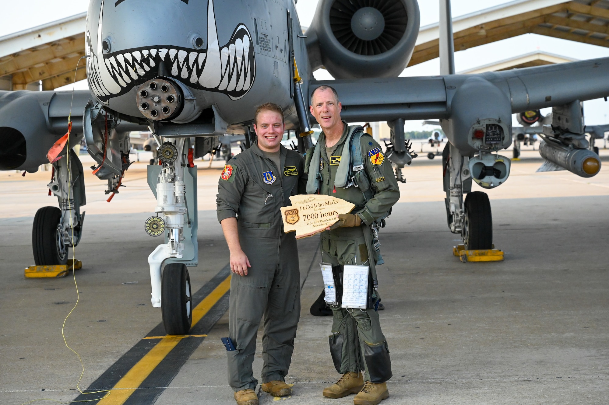 Lt. Col. John “Karl” Marks and 1st Lt. Dylan Mackey, A-10C Thunderbolt II pilots pose in front of an A-10C Thunderbolt II on Sept. 1, 2021 at Whiteman AFB, Mo. Marks, the longest flying A-10 pilot requested to fly with Mackey, the youngest pilot in the 303rd Fighter Squadron. 

Photo by U.S. Air Force Maj. Shelley Ecklebe