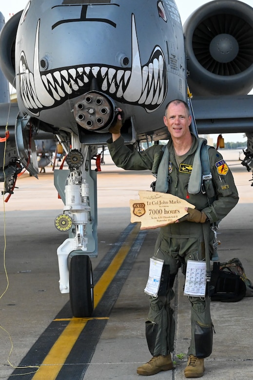 Lt. Col. John “Karl” Marks stands in front of an A-10C Thunderbolt II on Sept. 1, 2021 at Whiteman AFB, Mo. Marks reached a historic 7,000 hours in the A-10C and is the longest flying A-10 pilot to date.