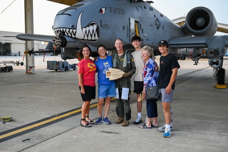 Lt. Col. John “Karl” Marks and his immediate family celebrate his 7,000 hour milestone of flying the A-10C Thunderbolt II on Sept. 1, 2021 at Whiteman AFB, Mo.