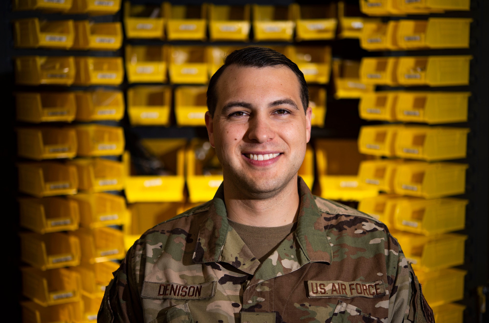 An Airman poses for a portrait.