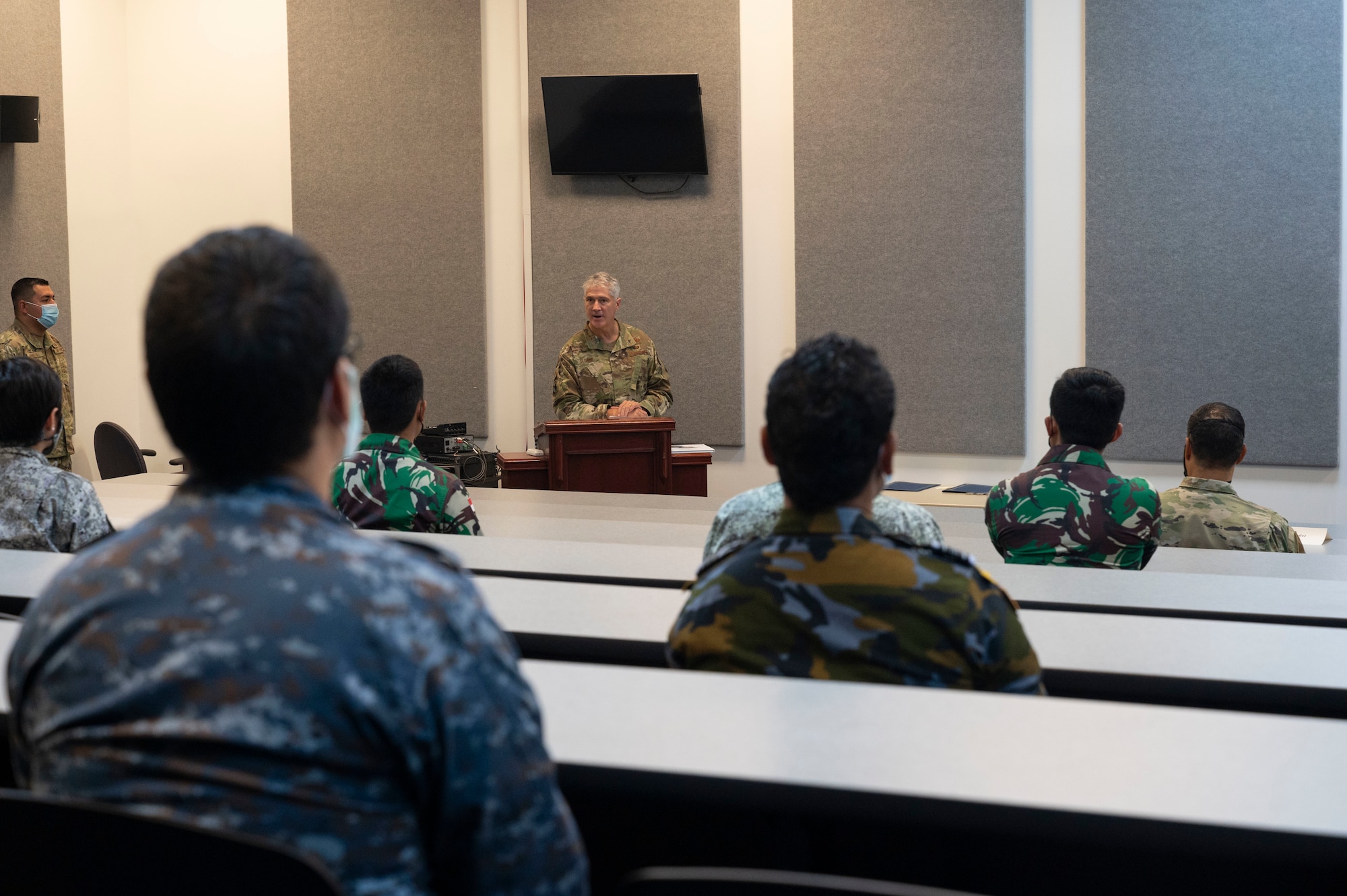 Brig. Gen. Jeremy Sloane, 36th Wing commander, speaks at the graduation of the Aircraft Maintenance Officer Course Event at Andersen Air Force Base, Guam, Aug. 20, 2021.
