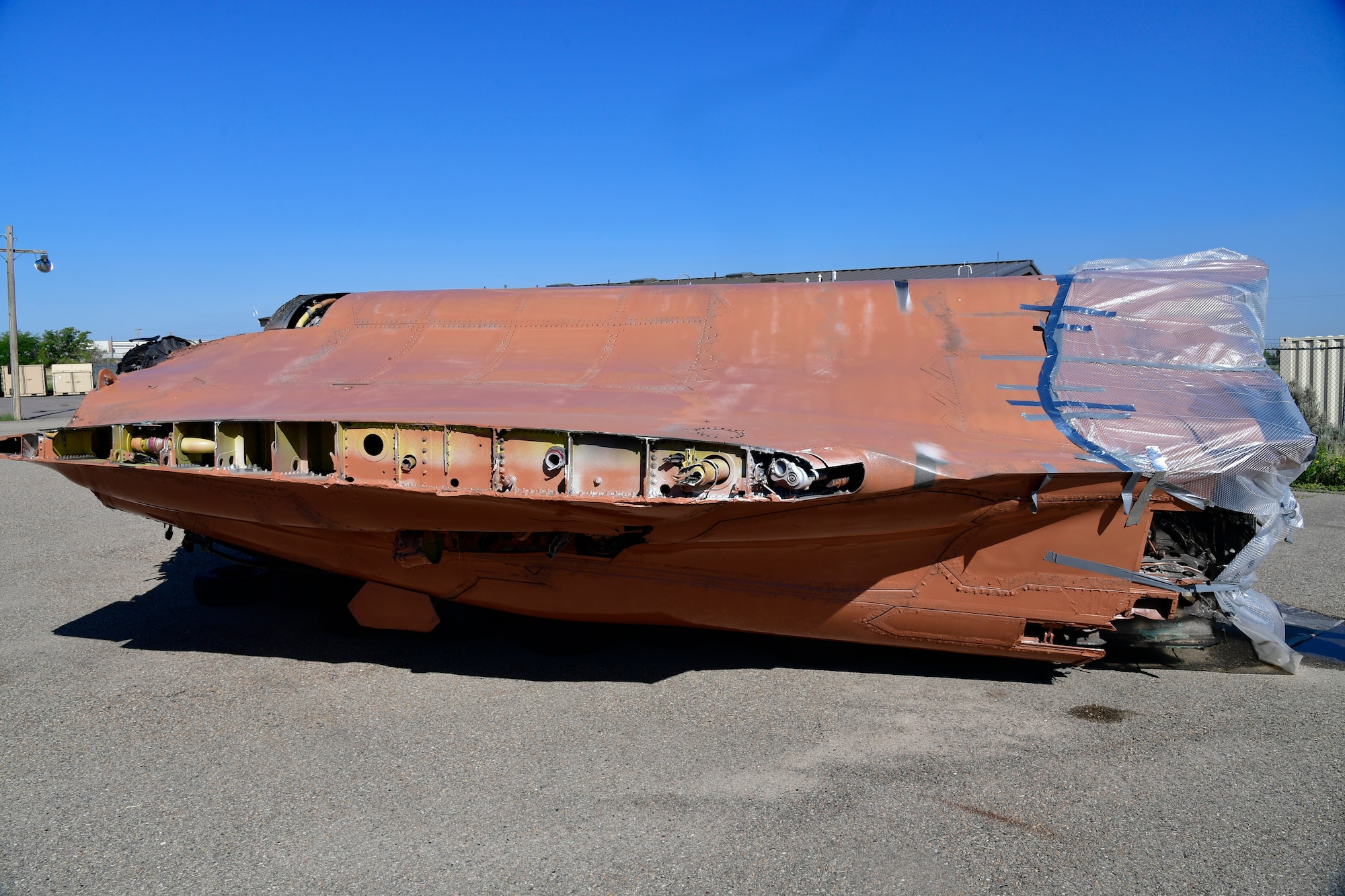 The fuselage of a condemned F-35A Lightning II Aug. 23, 2021, at Hill Air Force Base, Utah, that has been decontaminated, painted and made safe for further handling. The aircraft was involved in a landing mishap in 2020 at Eglin AFB, Florida, but is now being transformed into sectional training aids by Airmen at Hill AFB for use during instruction of F-35 maintainers. (U.S. Air Force photo by Todd Cromar)