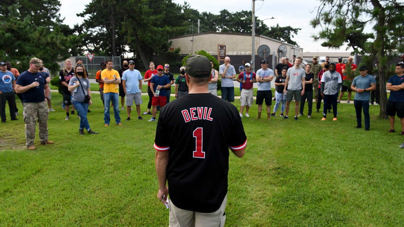 A commander speaks to Airmen.