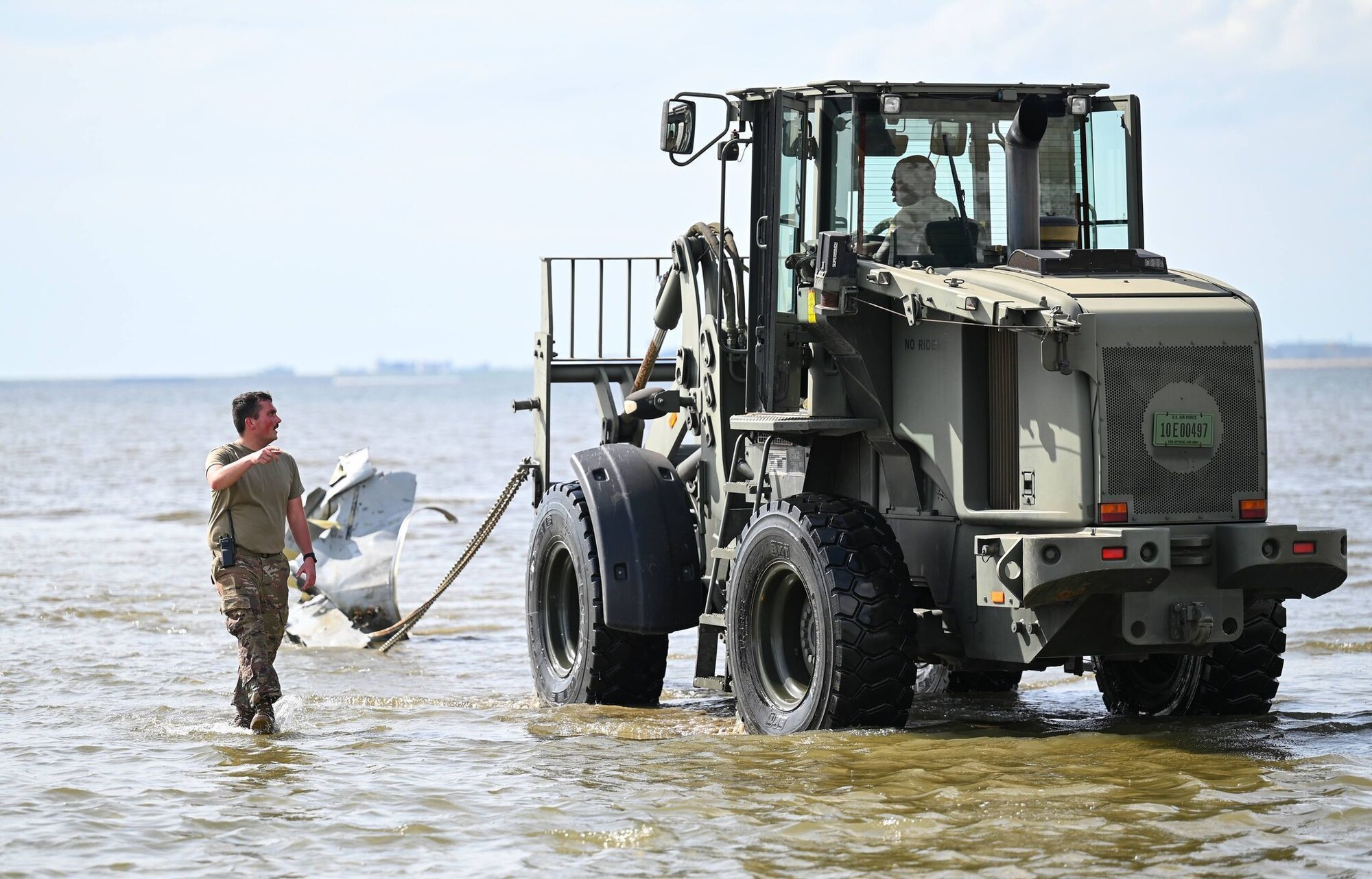 Airmen utilize a forklift.