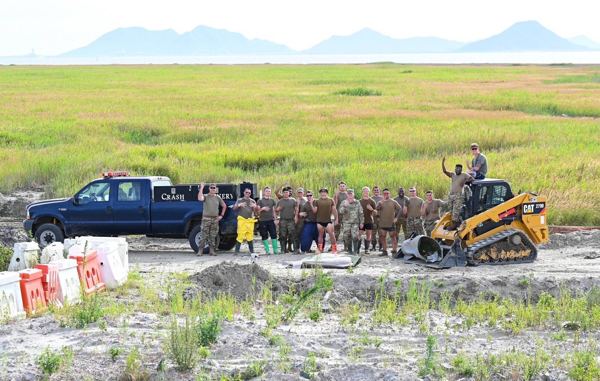 Airmen pose for a photo.