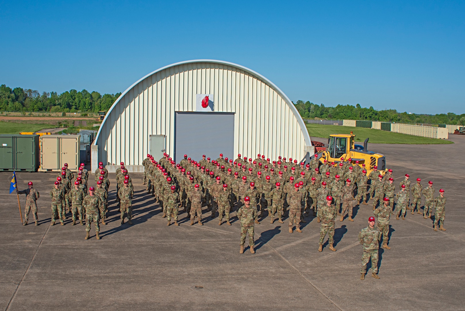 Members of the 201st Rapid Engineer Deployable Heavy Operational Repair Squadron Engineers, or REDHORSE, Detachment 1, pose for a picture at Biddle Air National Guard Base in Horsham, Pennsylvania, May 15, 2021. This is the first official group photo of the 201st REDHORSE Det. 1 in the Operational Camouflage Pattern, or OCP, utility uniform on base since they returned from their recent deployment overseas.