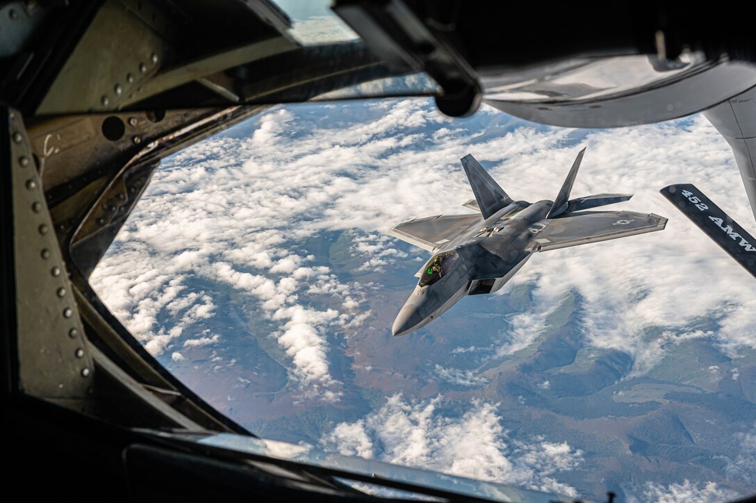 A U.S. Air Force jet departs after a mid-flight refuel.