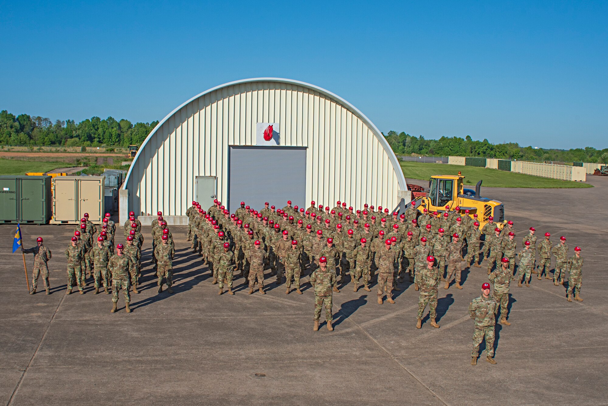 Members of the 201st Rapid Engineer Deployable Heavy Operational Repair Squadron Engineers, or REDHORSE, Detachment 1, pose for a picture at Biddle Air National Guard Base in Horsham, Pennsylvania, May 15, 2021. This is the first official group photo of the 201st REDHORSE Det. 1 in the Operational Camouflage Pattern, or OCP, utility uniform on base since they returned from their recent deployment overseas.