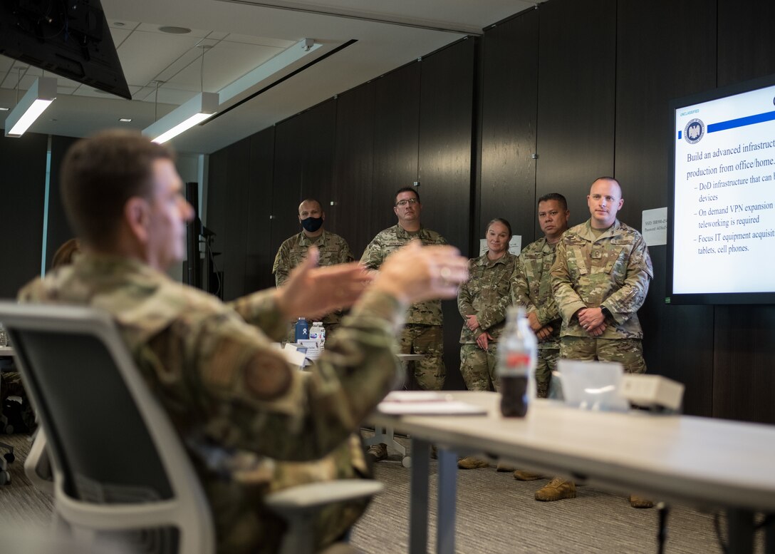 U.S. Air Force Lt. Gen. Michael A. Loh, director, Air National Guard (ANG), provides feedback to students on their capstone project during the Senior Noncommissioned Officer Enhancement Course at the ANG Readiness Center at Joint Base Andrews, Maryland, July 15, 2021. The first course of its kind, the curriculum is designed to empower and inspire senior enlisted leaders stationed across the 50 states, three territories, and District of Columbia to accelerate force-wide improvements and positive change. (U.S. Air National Guard photo by Tech. Sgt. Morgan R. Whitehouse)