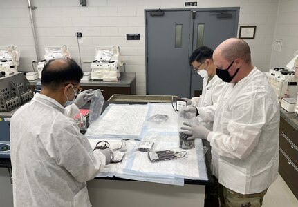 Members of the 95th Medical Detachment (Blood Support) perform cell processor checks July 26 at Camp Carroll, South Korea. (Maj. Clifford Wong)