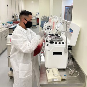 Members of the 95th Medical Detachment (Blood Support) perform deglycerolization and blood washing quality control checks July 28 at Camp Humphreys, South Korea. (Photo Credit: Maj. Clifford Wong)