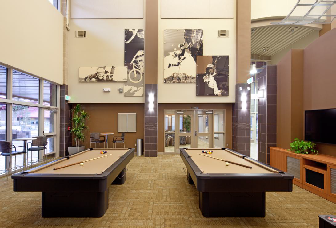 Pool tables in a common room.