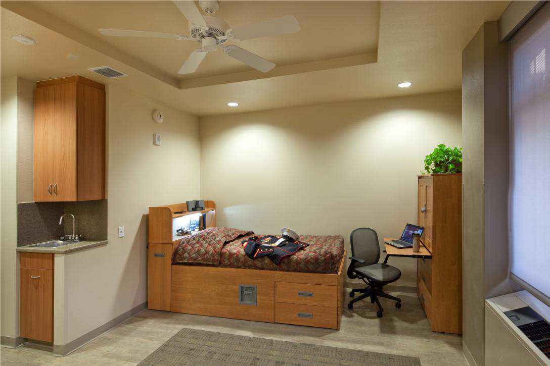 Twin bed in a bedroom.