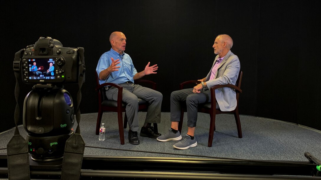Retired Lt. Gen. Ralph Jodice II (left), former 80th Flying Training Wing commander, talks to Maj. Gen. (ret.) Michael Collings, former 82nd Training Wing commander, about the events of 9/11