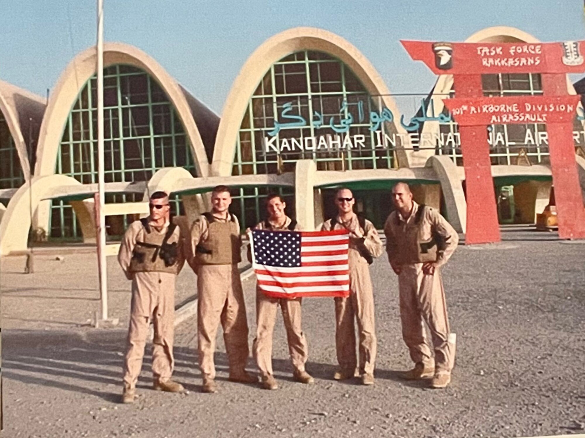 Col Franks holding US flag