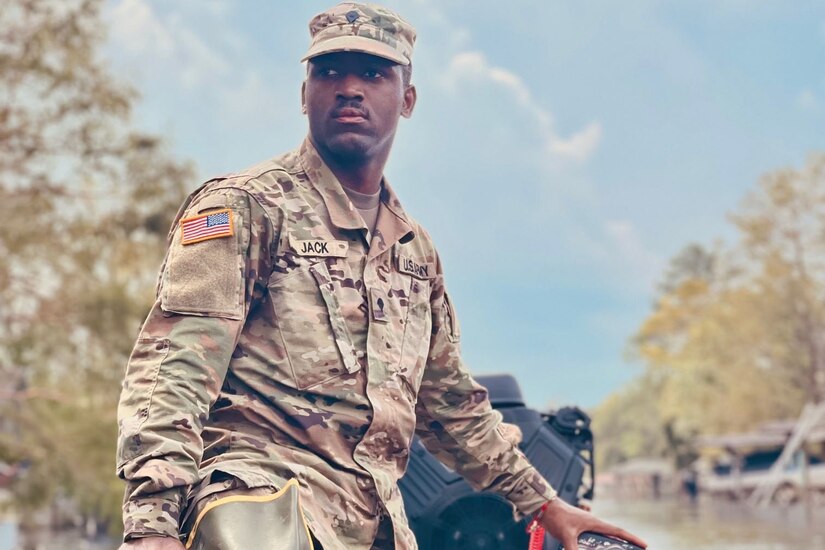 A man rides in a boat.