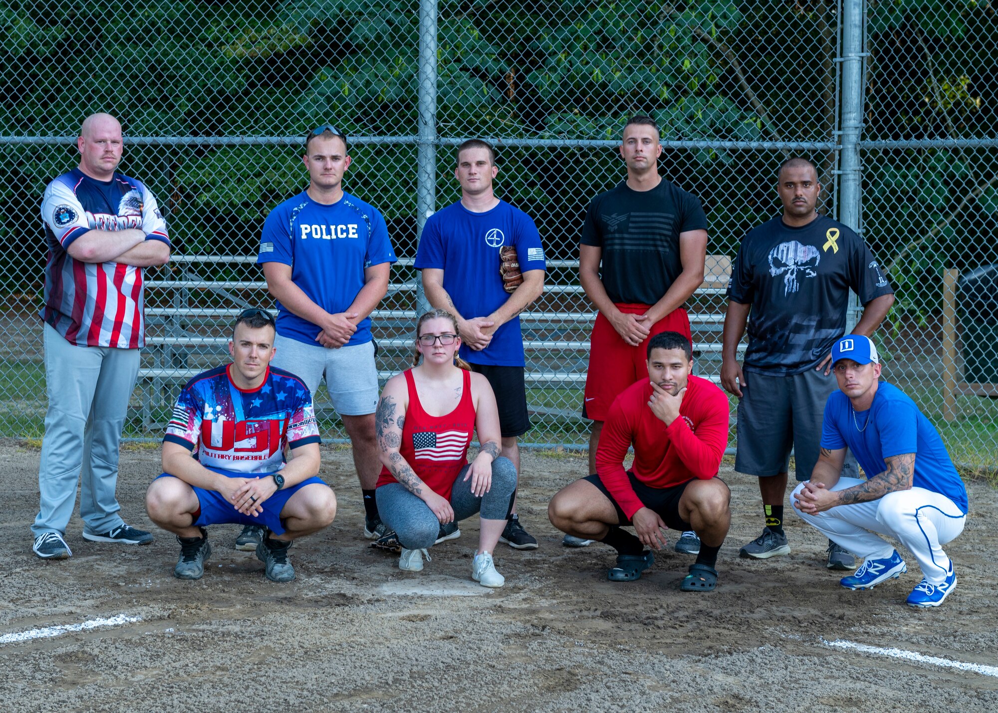 Members of Team Seymour from the 4th Security Forces Squadron at Seymour Johnson Air Force Base, pose for a photo prior to their softball game at Berkeley Park, North Carolina, Aug. 5, 2021.