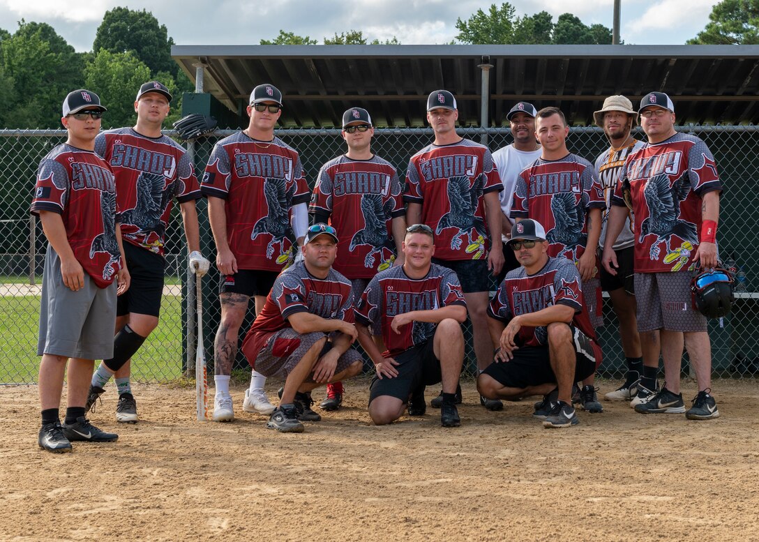 Members of Team Seymour from the 4th Munition Squadron at Seymour Johnson Air Force Base, pose for a photo prior to their softball game at Berkeley Park, North Carolina, Aug. 5, 2021.