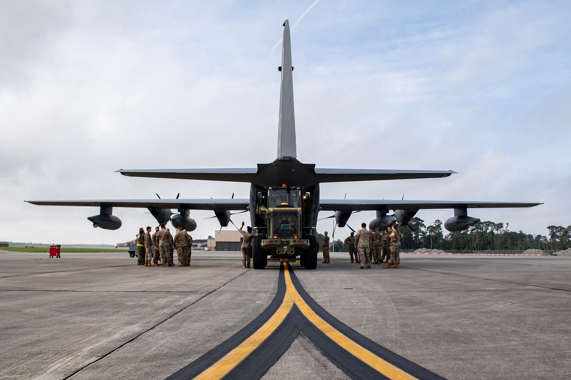 A U.S. Air Force Airman from the 23rd Logistics Readiness Squadron loads pallets onto an HC-130J Combat King II cargo aircraft at Moody Air Force Base, Georgia, Aug. 28, 2021. More than 160 Airmen from the 822nd Base Defense Squadron deployed to Holloman Air Force Base, New Mexico, , in support of Task Force – Holloman. The Department of Defense, through U.S. Northern Command, and in support of the Department of Homeland Security, is providing transportation, temporary housing, medical screening, and general support for at least 50,000 Afghan evacuees at suitable facilities, in permanent or temporary structures, as quickly as possible. This initiative provides Afghan personnel essential support at secure locations outside Afghanistan. (U.S. Air Force photo by Senior Airman Jasmine Barnes)