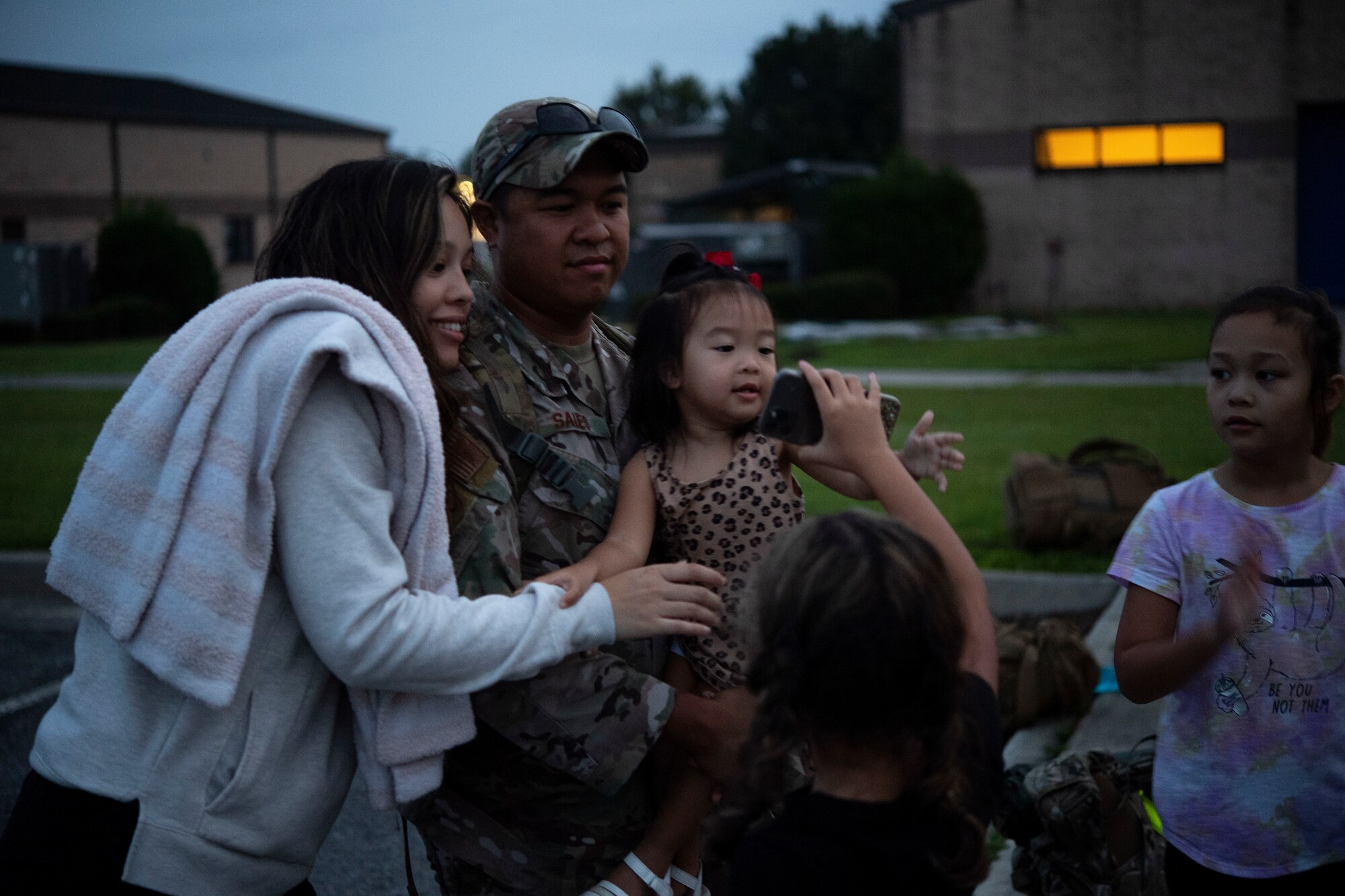 U.S. Air Force Staff Sgt. Jeff Sales, 822nd Base Defense Squadron combat arms instructor, spends time with his family at Moody Air Force Base, Georgia, Aug. 28, 2021. Sales and more than 160 Airmen from the squadron have deployed to Holloman Air Force Base, New Mexico, in support of Task Force – Holloman. The Department of Defense, through U.S. Northern Command, and in support of the Department of Homeland Security, is providing transportation, temporary housing, medical screening, and general support for at least 50,000 Afghan evacuees at suitable facilities, in permanent or temporary structures, as quickly as possible. This initiative provides Afghan personnel essential support at secure locations outside Afghanistan. (U.S. Air Force photo by Master Sgt. Daryl Knee)
