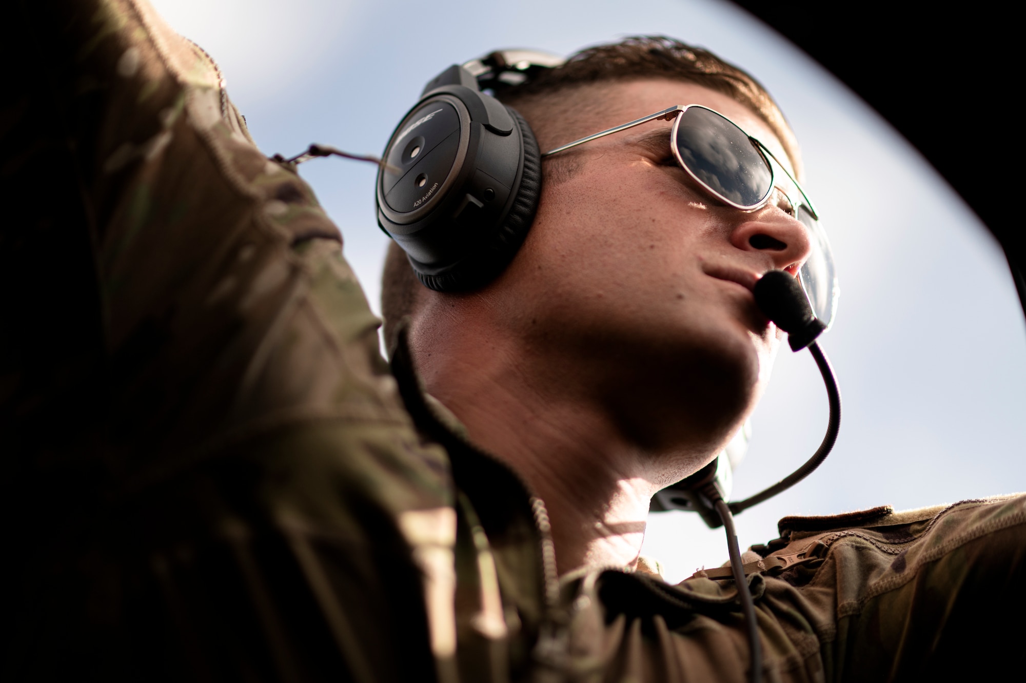 U.S. Air Force Capt. Ben Singer, 71st Rescue Squadron HC-130J pilot, waits for aircrew to finish pre-flight tasks before departing Moody Air Force Base, Georgia, aboard an HC-130J Combat King II aircraft, Aug. 29, 2021. The 71st RQS provided airlift for the 822nd Base Defense Squadron’s deployment. The 822nd BDS were tasked to provide an enhanced security presence at Holloman Air Force Base, New Mexico, in support of Task Force – Holloman. The Department of Defense, through U.S. Northern Command, and in support of the Department of Homeland Security, is providing transportation, temporary housing, medical screening, and general support for at least 50,000 Afghan evacuees at suitable facilities, in permanent or temporary structures, as quickly as possible. This initiative provides Afghan personnel essential support at secure locations outside Afghanistan. (U.S. Air Force photo by Staff Sgt. Devin Boyer)