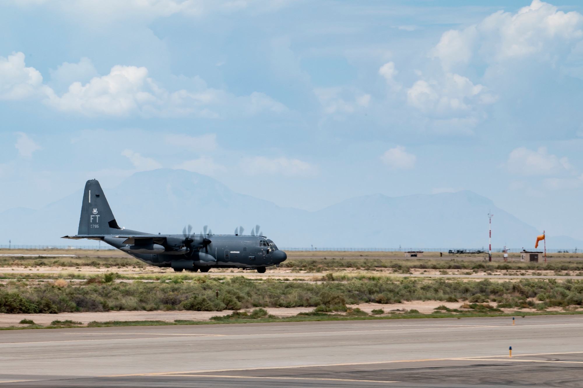 U.S. Air Force aircrew from the 71st Rescue Squadron, Moody Air Force Base, Georgia, arrive at Holloman Air Force Base, New Mexico, with members of the 822nd Base Defense Squadron, Aug. 29, 2021. The 822nd BDS were tasked to provide an enhanced security presence at Holloman AFB in support of Task Force – Holloman. The Department of Defense, through U.S. Northern Command, and in support of the Department of Homeland Security, is providing transportation, temporary housing, medical screening, and general support for at least 50,000 Afghan evacuees at suitable facilities, in permanent or temporary structures, as quickly as possible. This initiative provides Afghan personnel essential support at secure locations outside Afghanistan. (U.S. Air Force photo by Staff Sgt. Devin Boyer)