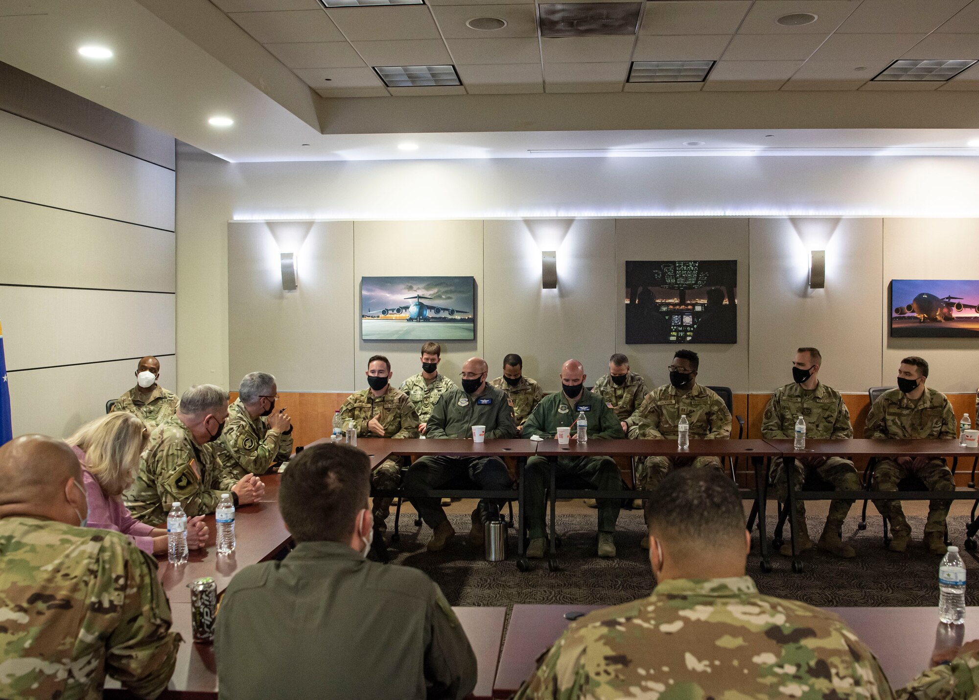 Photo of Airmen speaking with U.S. Army Gen. Mark Milley, the 20th Chairman of the Joint Chiefs of Staff.