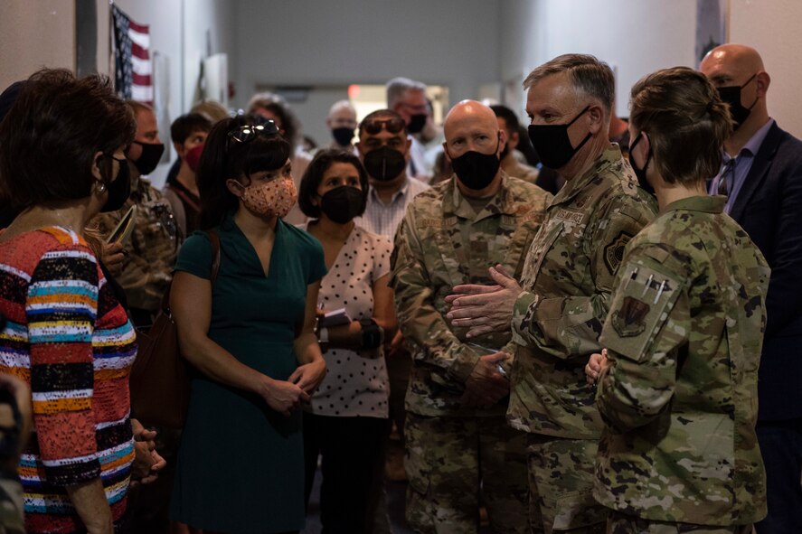 Gen. Glen VanHerck, Commander, North American Aerospace Defense Command and U.S. Northern Command, and U.S. Marine Corps Sgt. Maj. James Porterfield, NORAD and USNORTHCOM Command Senior Enlisted Leader, joined with Mr. Terry Todd, Department of Homeland Security's Federal Coordinator at Holloman AFB; Mr. Joe Parente, Department of State Team Lead; Rep. Melanie Stansbury (D-NM-1) and Rep. Yvette Herrell (R-NM-2), touring housing facilities and other support functions for the Afghan evacuees on the installation. (U.S. Air Force photo by Staff Sgt. Kenneth Boyton)