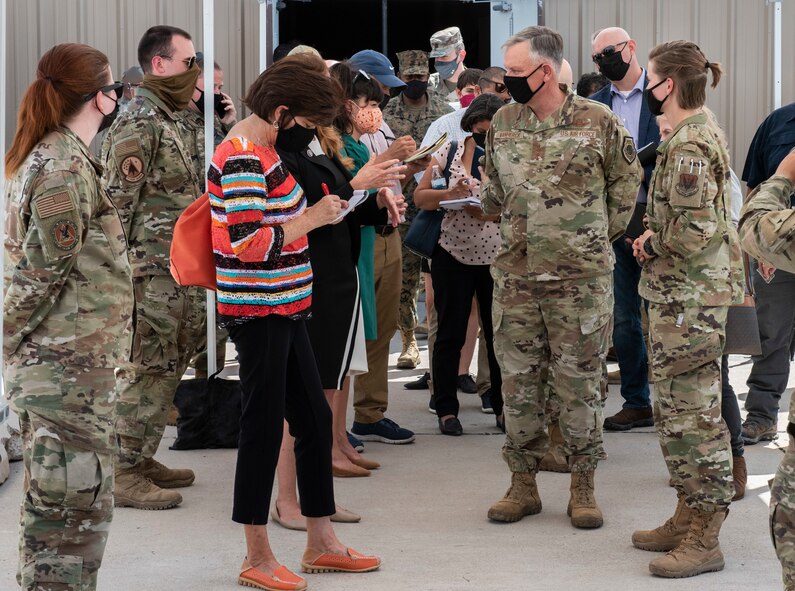 Gen. Glen VanHerck, Commander, North American Aerospace Defense Command and U.S. Northern Command, and U.S. Marine Corps Sgt. Maj. James Porterfield, NORAD and USNORTHCOM Command Senior Enlisted Leader, joined with Mr. Terry Todd, Department of Homeland Security's Federal Coordinator at Holloman AFB; Mr. Joe Parente, Department of State Team Lead; Rep. Melanie Stansbury (D-NM-1) and Rep. Yvette Herrell (R-NM-2), touring housing facilities and other support functions for the Afghan evacuees on the installation. (U.S. Air Force photo by Staff Sgt. Kenneth Boyton)