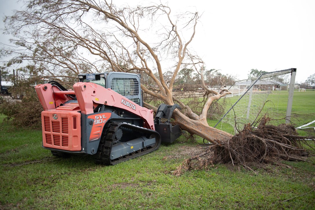 Members of the Texas Air National Guard’s 149th Fighter Wing help clean up the Raceland Community Center in Raceland, La., during Hurricane Ida response Sept. 6, 2021.