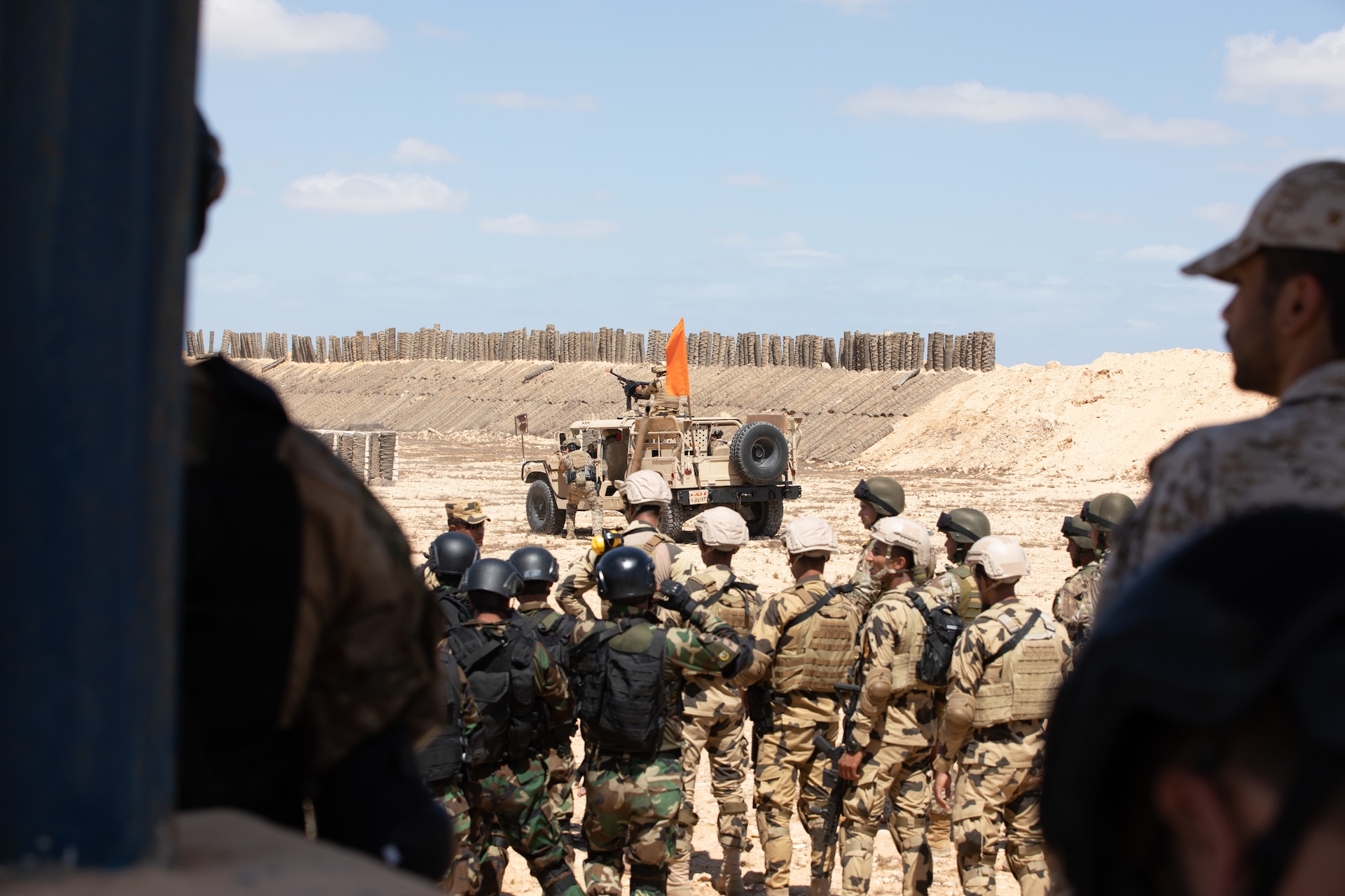 U.S. and partner nation special operations forces work together to improve firing techniques during Bright Star 21 (BS21) at Mohamed Naguib Military Base (MNMB), Egypt, Sept. 5, 2021. BS21 increases interoperability for future threat response in conventional and irregular warfare. (U.S. Army photo by Spc. Amber Cobena)