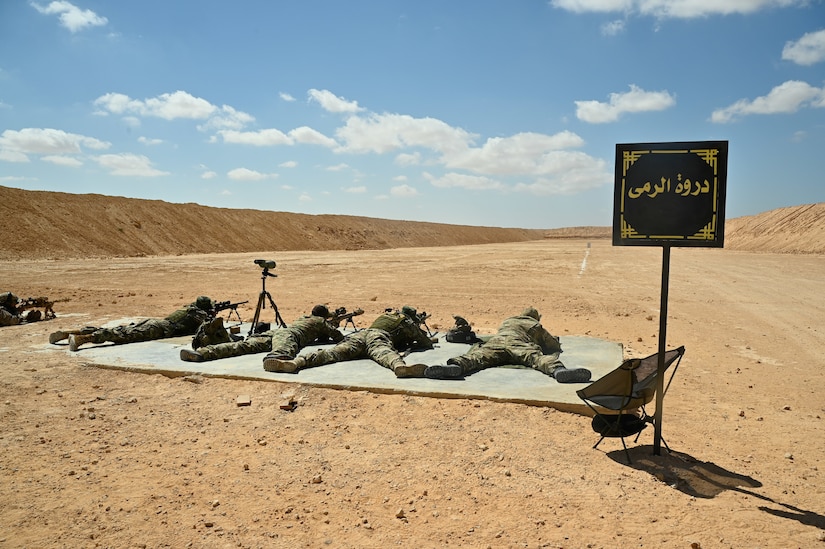 U.S. and U.K. special operations forces fire sniper rifles side by side at targets down range during Bright Star 21 (BS21) at Mohamed Naguib Military Base (MNMB), Egypt, Sept. 5, 2021. BS21 increases interoperability for future threat response in conventional and irregular warfare. (U.S. Army photo by Spc. Amber Cobena)