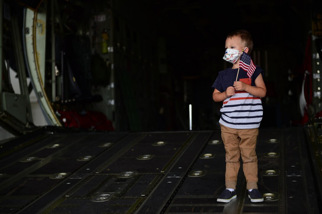 Photo of child on the ramp of an aircraft