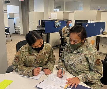 U.S. Air Force Staff Sgt. Erica Frazier, 811th Force Support Squadron deployment and training manager, right, was nominated for the 2021 Tuskegee Airmen, Inc. Senior Master Sgt. Margaret Barbour Frances Military Award for NCOs and Airmen at the 11th Wing, Joint Base Anacostia-Bolling, Washington, D.C. Nominees exhibited outstanding performance in both professional and community service. Three Airmen nominated in three categories from the 11th Wing at JBAB will now compete at the Air Force District of Washington direct-reporting unit and major command level. (Courtesy photo)