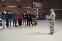 Maj. Gen. Torrence Saxe, adjutant general of the Alaska National Guard, speaks to Soldiers in the armory at Joint Base Elmendorf-Richardson, as they prepare to depart for Louisiana, Sept. 3, 2021. The 17 Army Guardsmen will assist the Louisiana National Guard’s support to civil authorities in the aftermath of Hurricane Ida, which struck the state, causing destruction and devastation, Aug. 29. The National Guard is the first military responder, assisting civil authorities and partner agencies with homeland security and response to state and national emergencies and disasters. The Soldiers are in civilian attire for travel on commercial aircraft. (Air National Guard photo by Lt. Col. Candis Olmstead)