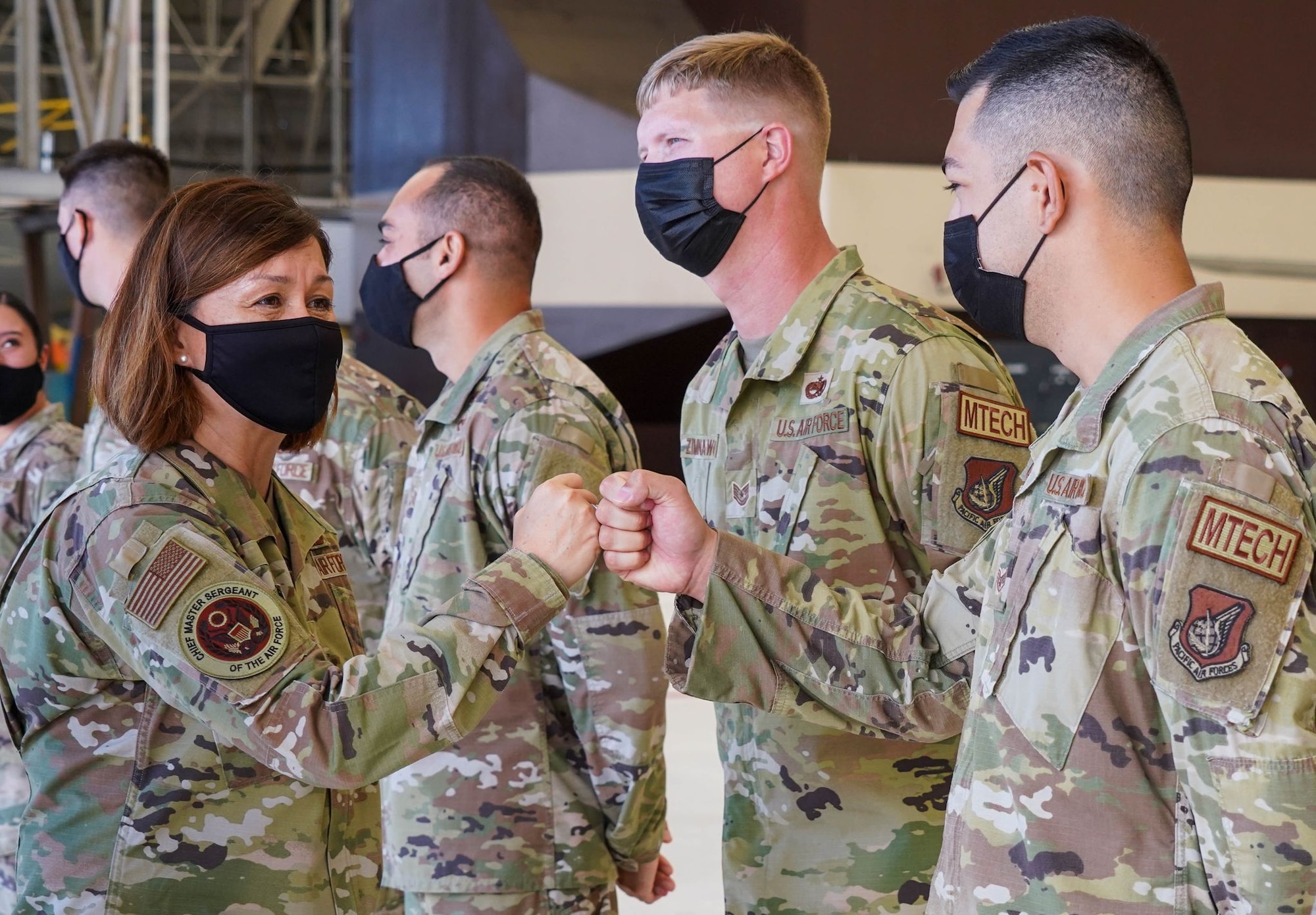 Chief Master Sergeant of the Air Force JoAnne S. Bass visits with Airmen across the 15th Wing during a base tour at Joint Base Pearl Harbor-Hickam, Hawaii, August 31, 2021. Chief Bass visited several squadrons around JBPHH to gain a look into their unique mission and discuss priorities such as people, culture, and readiness. (U.S. Air Force photo by Airman 1st Class Makensie Cooper)