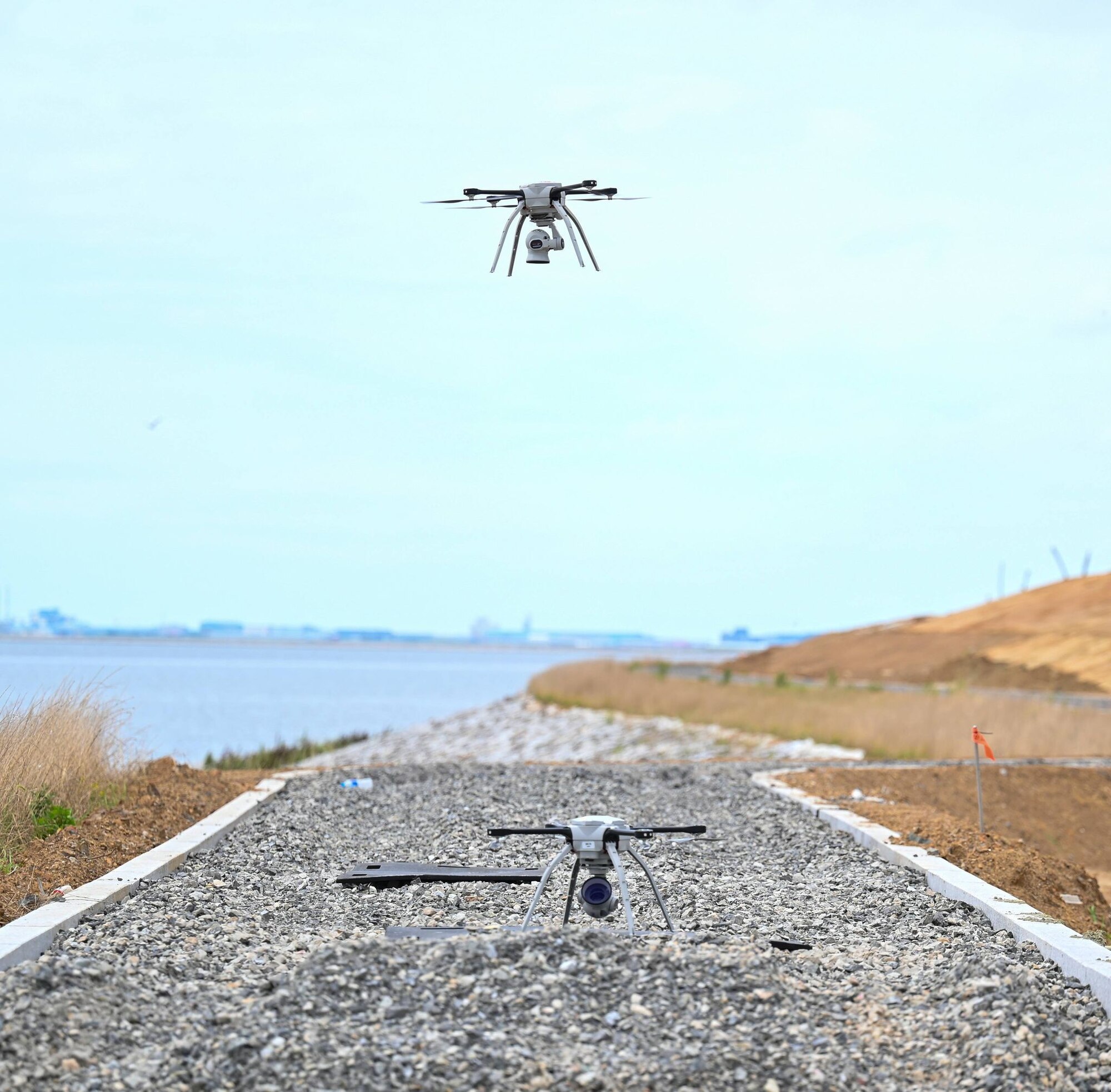 A drone hovers during water recovery operations.