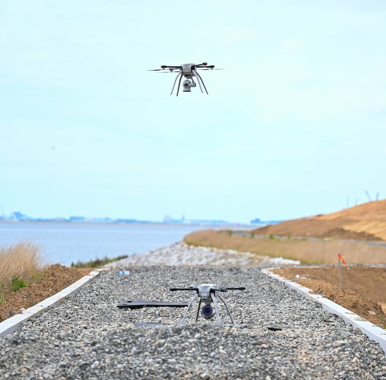 A drone hovers during water recovery operations.