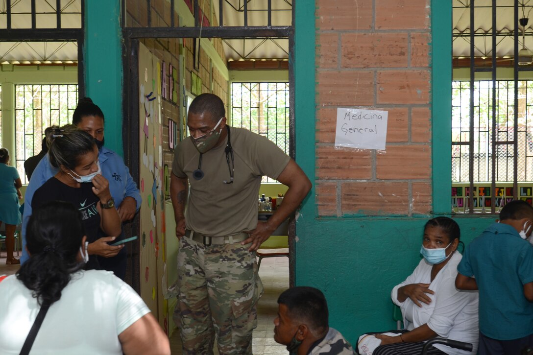 U.S. Air Force Maj. Alan Barrett, a physician assistant with the 169th Medical Group, pre-screens patients September 4, 2021. South Carolina National Guard medical personnel  traveled to the remote town of Tamana, Colombia to participate in a real-word community medical and humanitarian support mission. While there, the medical personnel provided dental, optical, dermatology, pharmacy and general medical care to more than 300 patients. South Carolina Air National Guard and South Carolina Army National Guard medical personnel participate in the regional Ángel de los Andes (Angel of the Andes) and Cooperación VII exercises in Colombia August 30 to September 10, 2021. The exercises provide training opportunities with South Carolina’s state partner Colombia in realistic combat search and rescue missions as well as humanitarian aid and disaster response scenarios such as earthquakes and tsunamis. (U.S. Air National Guard photo by Lt. Col. Jim St.Clair, 169th Fighter Wing Public Affairs)