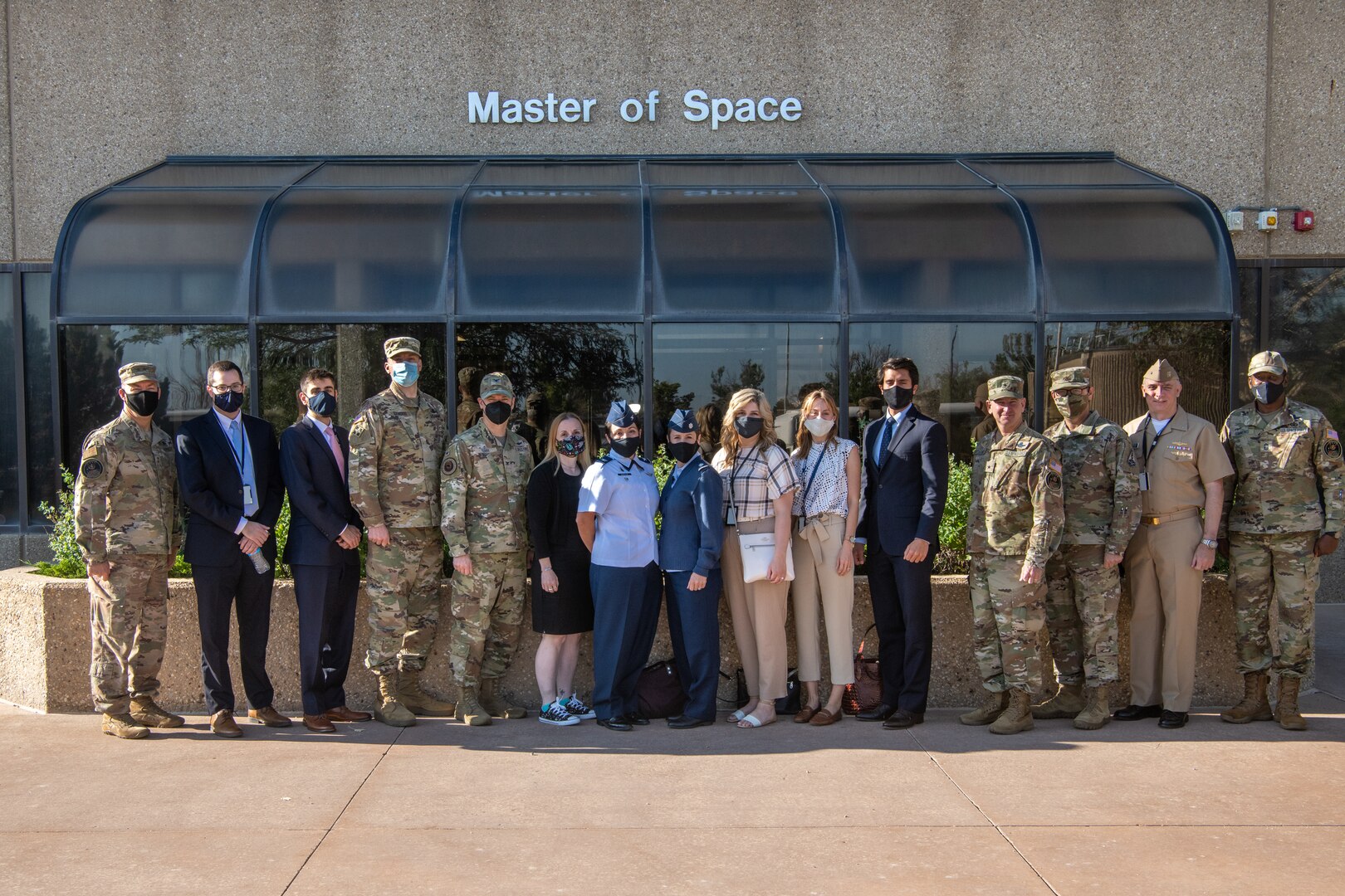 DoD Delegation members pose for photo