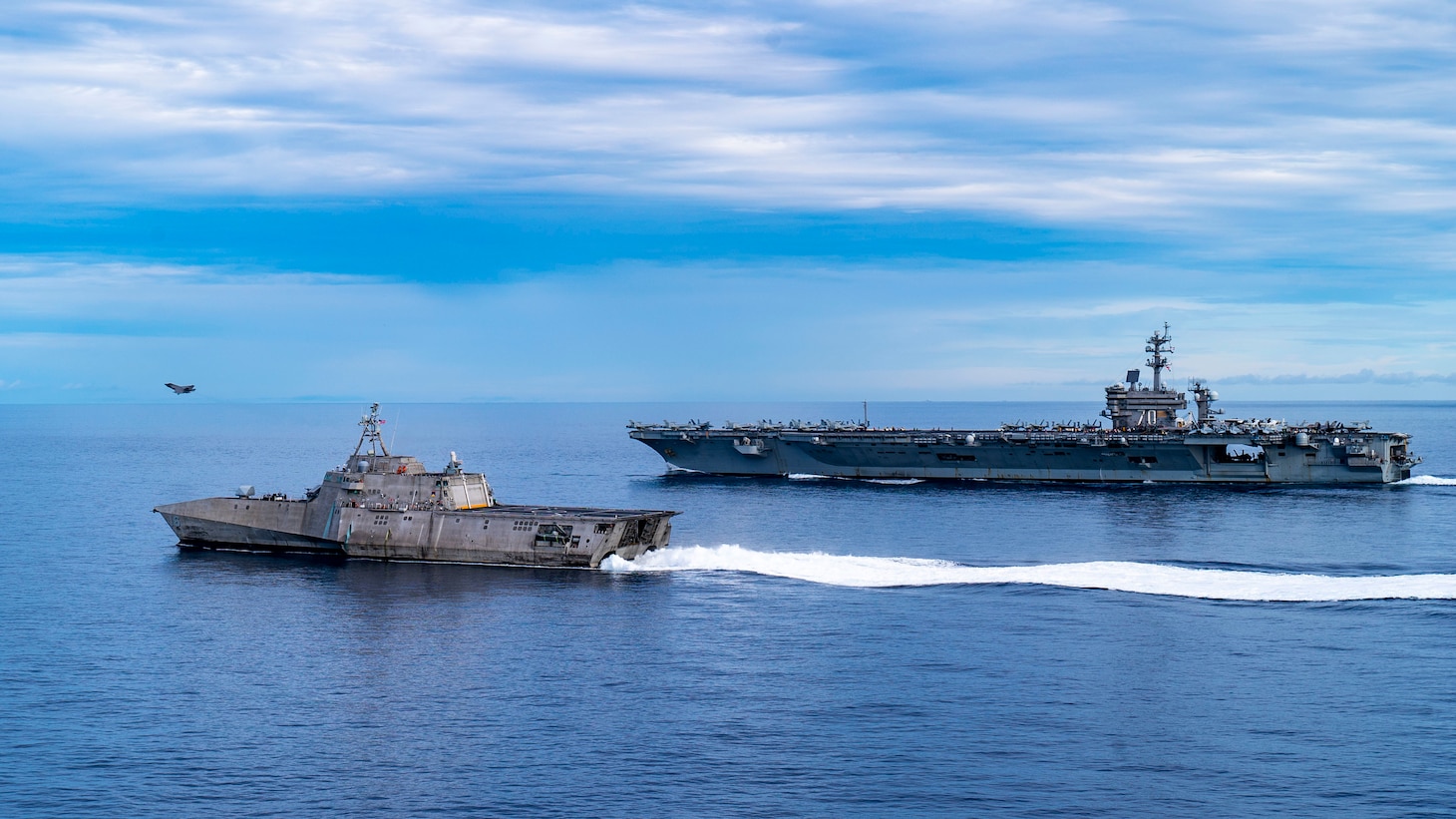 An F-35C Lightning II, assigned to the “Argonauts” of Strike Fighter Squadron (VFA) 147, launches from the flight deck of Nimitz-class aircraft carrier USS Carl Vinson (CVN 70) while the carrier transits the South China Sea with Independence-variant littoral combat ship USS Tulsa (LCS 16), Sept. 7, 2021. Carl Vinson Carrier Strike Group is on a scheduled deployment in the U.S. 7th Fleet area of operations to enhance interoperability with allies and partners while serving as a ready-response force in support of a free and open Indo-Pacific region.