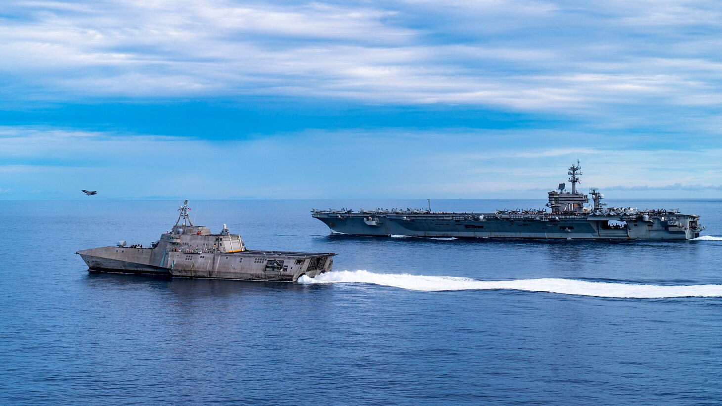 An F-35C Lightning II, assigned to the “Argonauts” of Strike Fighter Squadron (VFA) 147, launches from the flight deck of Nimitz-class aircraft carrier USS Carl Vinson (CVN 70) while the carrier transits the South China Sea with Independence-variant littoral combat ship USS Tulsa (LCS 16), Sept. 7, 2021. Carl Vinson Carrier Strike Group is on a scheduled deployment in the U.S. 7th Fleet area of operations to enhance interoperability with allies and partners while serving as a ready-response force in support of a free and open Indo-Pacific region.