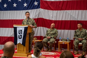 Vice Adm. Brad Cooper, commander of U.S. Naval Forces Central Command, U.S. 5th Fleet and Combined Maritime Forces, speaks during a commissioning ceremony for Task Force (TF 59) onboard Naval Support Activity Bahrain, Sept. 9. TF 59 is the first U.S. Navy task force of its kind, designed to rapidly integrate unmanned systems and artificial intelligence with maritime operations in the U.S. 5th Fleet area of operations.