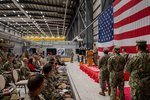 Vice Adm. Brad Cooper, commander of U.S. Naval Forces Central Command, U.S. 5th Fleet and Combined Maritime Forces, speaks during a commissioning ceremony for Task Force (TF 59) onboard Naval Support Activity Bahrain, Sept. 9. TF 59 is the first U.S. Navy task force of its kind, designed to rapidly integrate unmanned systems and artificial intelligence with maritime operations in the U.S. 5th Fleet area of operations.