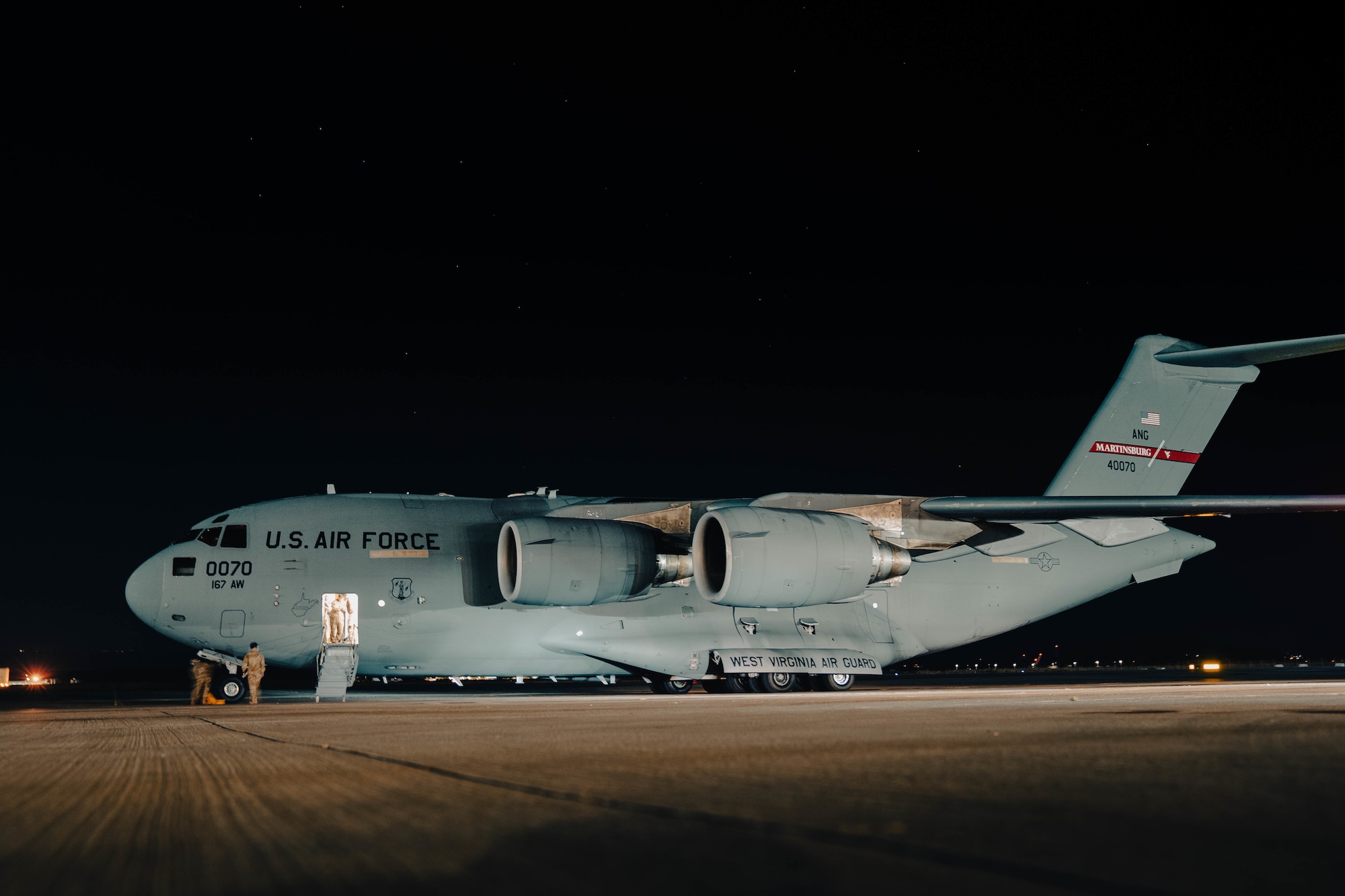 A West Virginia Air National Guard C-17 Globemaster lll carrying Afghanistan evacuees arrives at Naval Air Station Sigonella in Italy Aug. 22, 2021. Two aircrews from the 167th Airlift Wing transported passengers and cargo into and out of Hamid Karzai International Airport in Kabul.