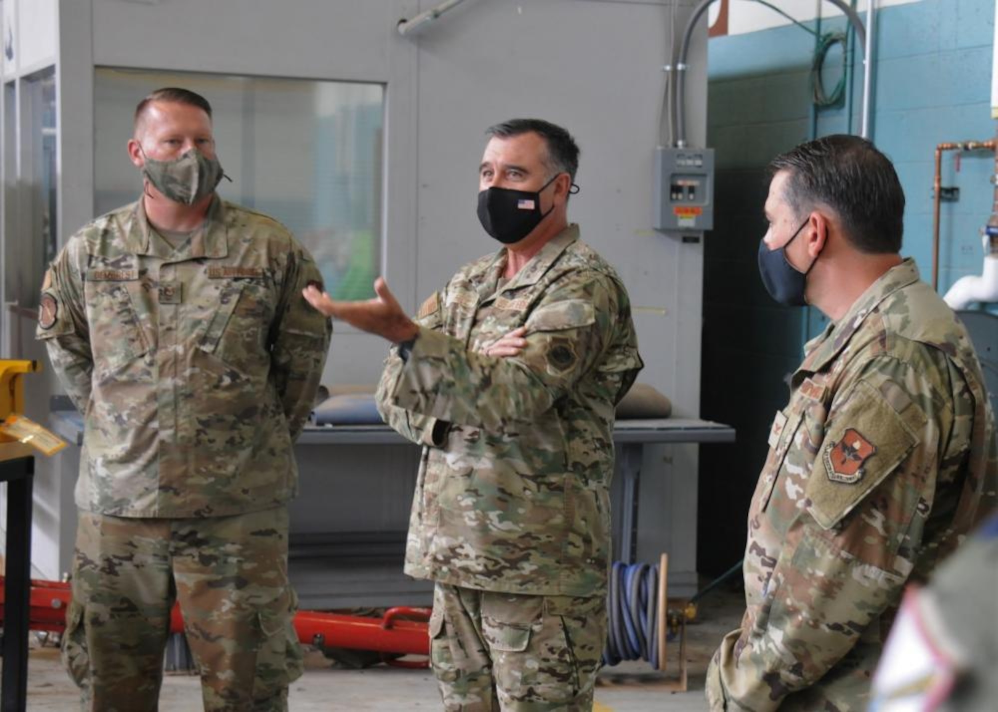 Air Force officer speaks to Airmen.