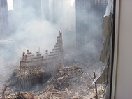 Ground Zero -- taken by the AST from the World Financial Building (we were charged to get hard drives from critical PCs)."; 13 September 2001; photo by MST1 Robert J. Schrader.
Provided courtesy of MST1 Robert J. Schrader.