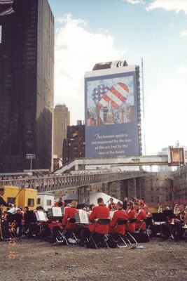 "The President's Own" United States Marine Band performs under the direction of Col. Timothy Foley at Ground Zero for the first anniversary of 9/11.